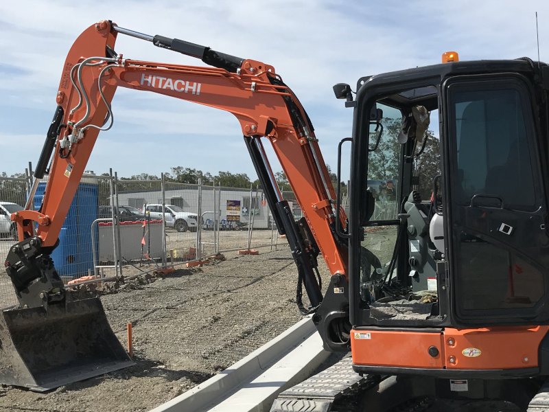 Excavator backfilling