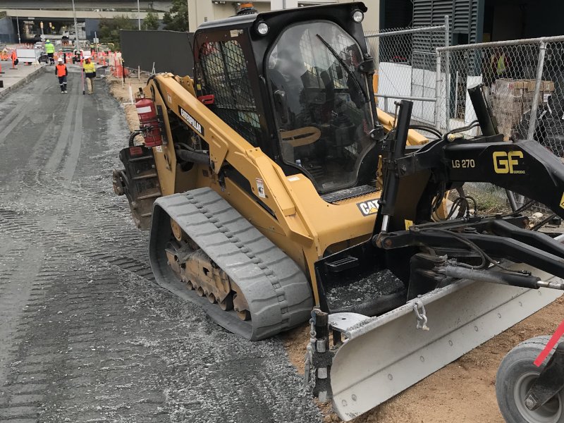 Posi Track Loader grading